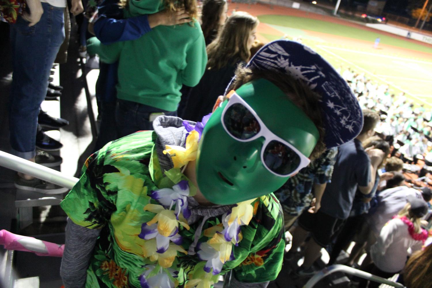 One student took his spirit to another level at last week’s game by deciding to wear a mask and Ray Bans, using a Hawaiian shirt and lei to keep with the theme. 