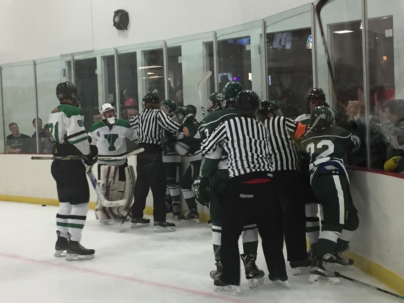 After the buzzer rang, both teams brawled behind the Dukes net at the Varsity game on Fri. Sept. 15.