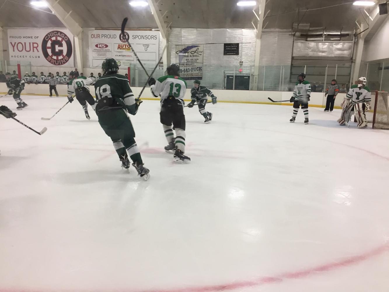 Junior Chris Lee (#13) playing defense to ensure that Providence did not score a tying goal in the final seconds of the game. Lee also scored a goal in the 3rd period. 
