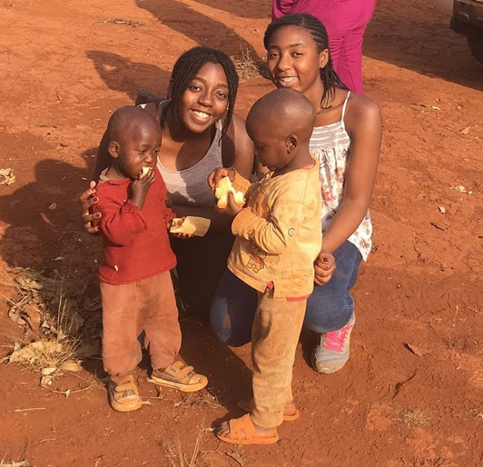 In the village Darelles mother grew up in, Darelle and her sister meet two young boys while on a clothes drive during winter break of 2016.