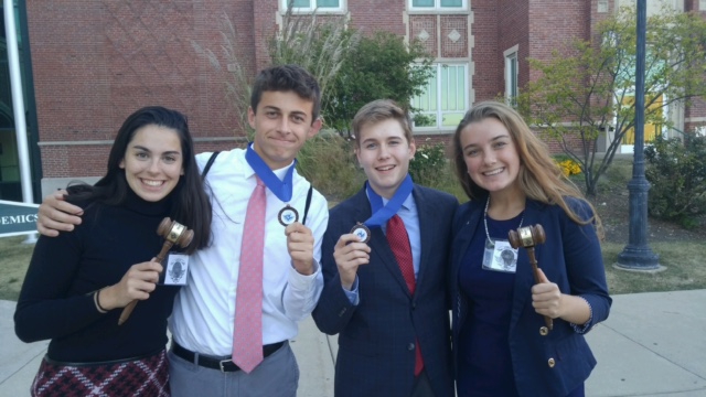 Award winners (left to right) Mollie Grasse (junior), Steve Chornji (sophomore), Nick Pomatto (sophomore) and Cambria Khayat (senior) celebrate with their honrable mentions and best delegate awards.