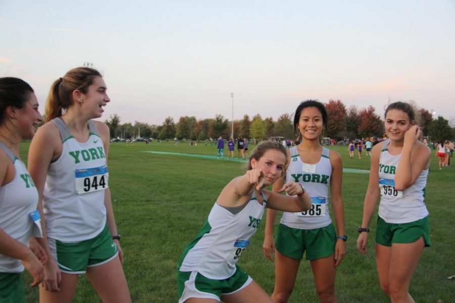 Seniors Hailey Walker (left), Lily Kilgast, Jayne Jurasek, Emma Tran, and Shannon Maher pose after finishing their last cross country meet ever. The Western Suburban Silver Conference Division Meet took place at Glenbard East on Wednesday, October 18th. 
