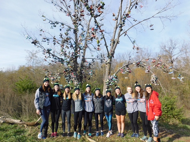 The girls KROY team poses in front of the infamous shoe tree, at the Lavern Gibson course. (Nov. 12, 2017)