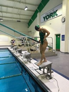 Senior Kat Siavelis  practices her starts before a Swim and Dive meet. Oct. 26, 2017.