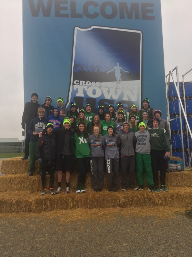 The boys KROY team and the girls KROY team pose together at the course after their races finished. (Nov. 12,2017)