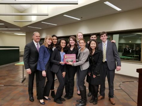 York Law Team poses with the competition facilitators after being awarded second place. at the Skokie mock trial competition on Jan. 25, 2017. 
