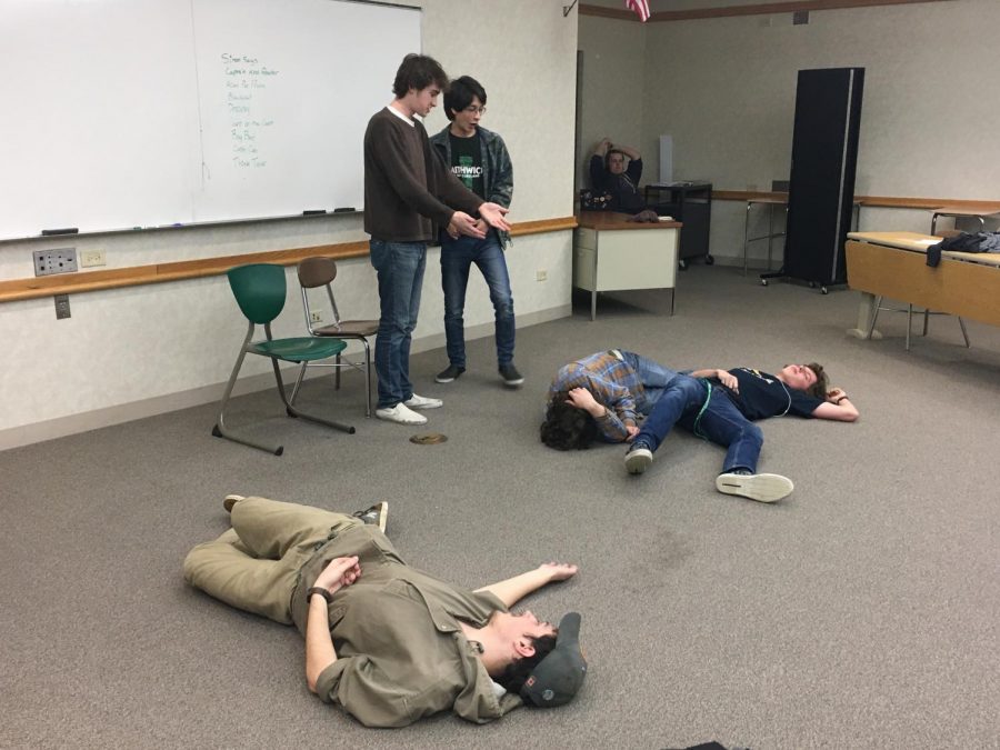 Members of Sketch play dead during a practice for one of their sketches. 