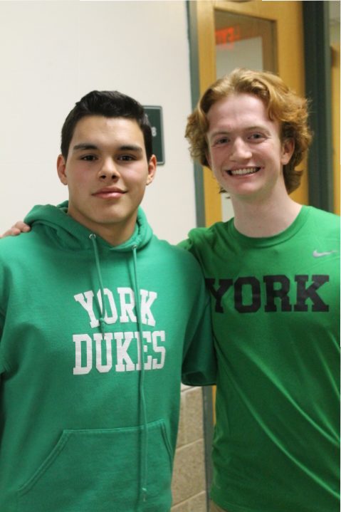 Contestants Gio Rodriguez and Luke Ahern relish in accomplishment after tying for the coveted title of Mr. Duke .