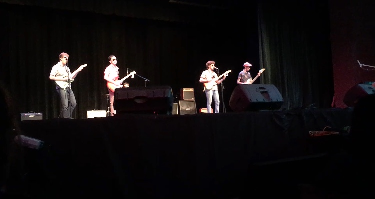 Senior band, Squad Wipe, performing a cover of Escape in Talent Show A.