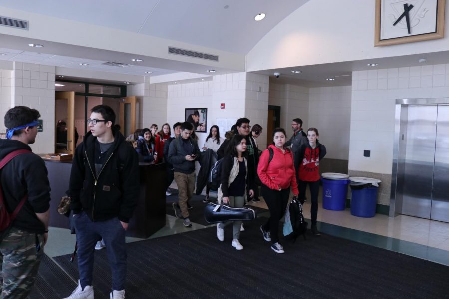 Students make their way to the Academic Entrance to begin the historic walkout. Wed., March 14, 2018.