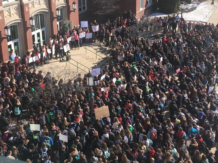 As part of a nationwide walkout, students rally on steps in front of auditorium entrance in support of safer schools. March 14, 2018.