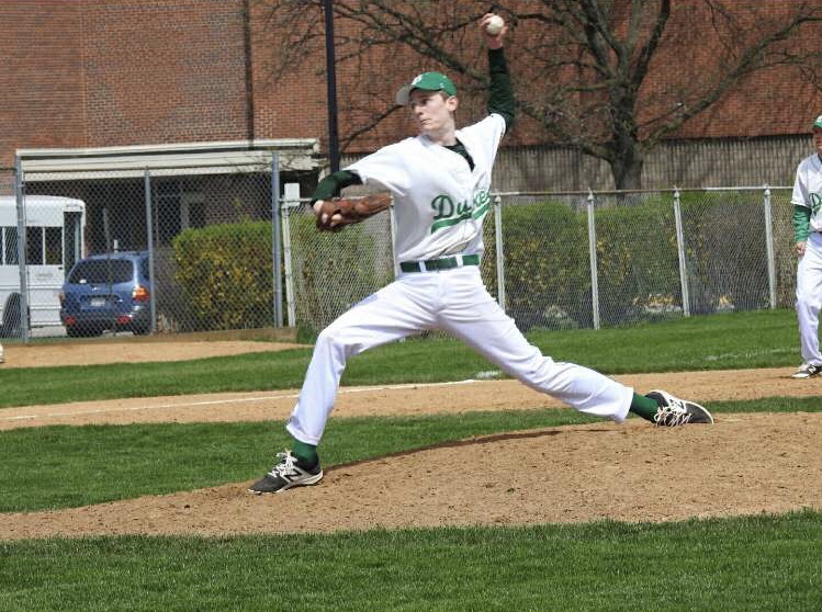Senior Scott Tucker pitching during a game on the York Field. 