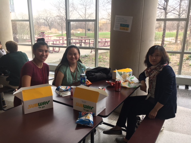 After their competition, freshmen Anna Collins and Mia Beres ate lunch with Mrs. Chou as they nervously wait for the results. April. 21, 2018.