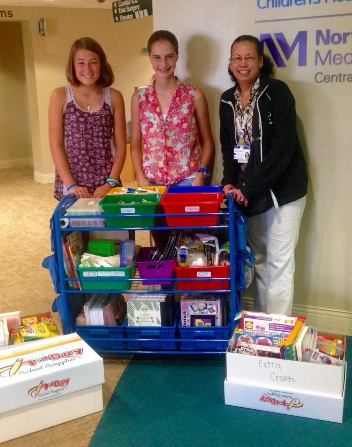 Mia Sherman and Ruby Schwan dropping off the craft cart at Dupage Hospital for the completion of their silver award.