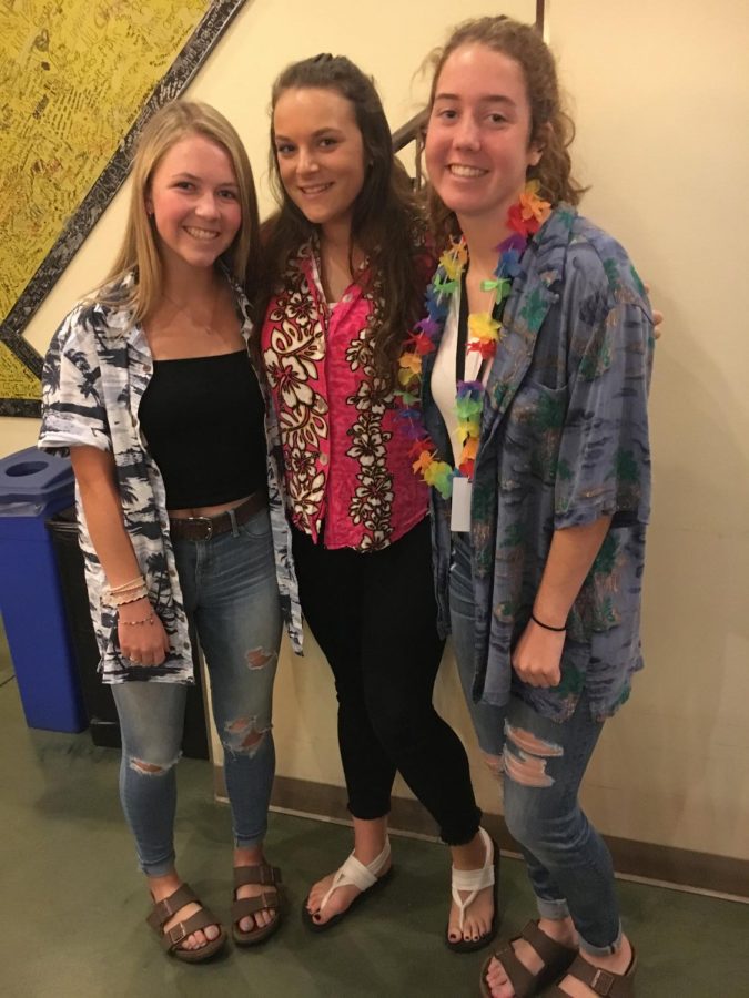 Seniors Brooke Johnson, Audrie Carani, and Claire Libert dress for a luau for this years Tropical Tuesday. Photo by Isabelle Downey 