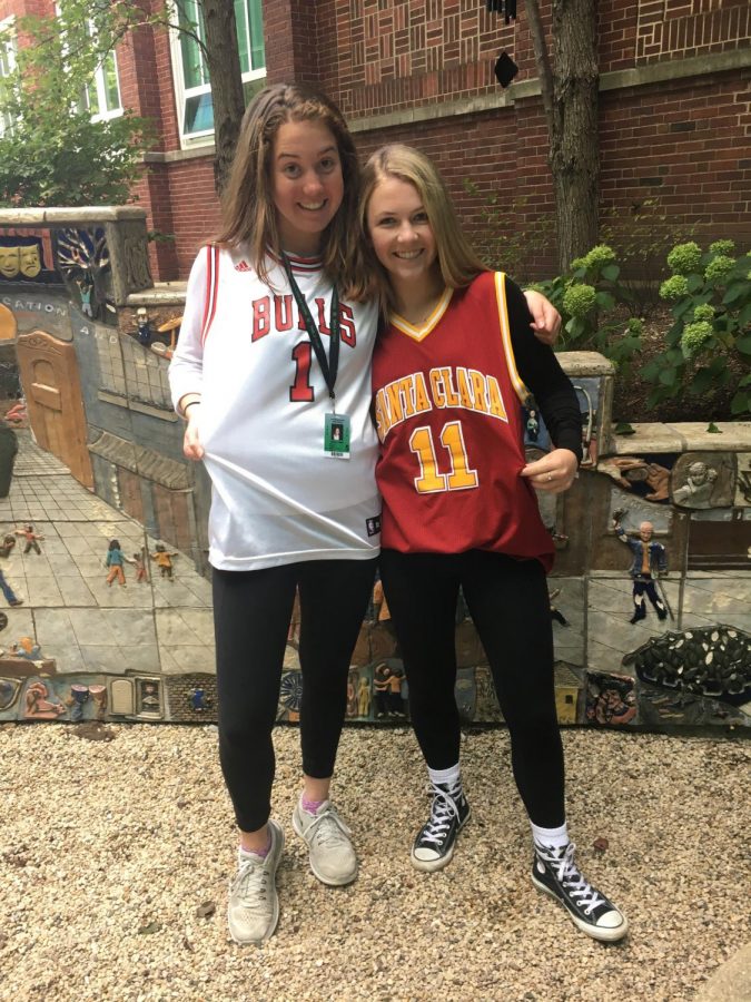 Seniors Claire Libert and Brooke Johnson rep their favorite basketball teams for jersey Thursday.