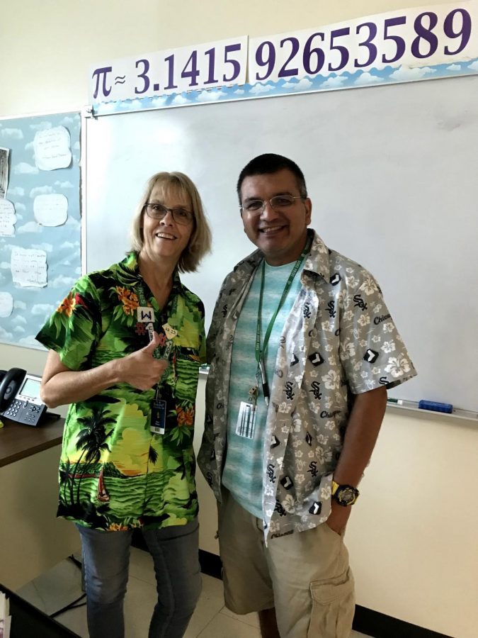 Math teacher Mrs. Mordini and Mr. Zamora arent afraid to show off their Hawaiian garb for Tuesdays Hawaiian spirt day. Photo by Rachel Perry