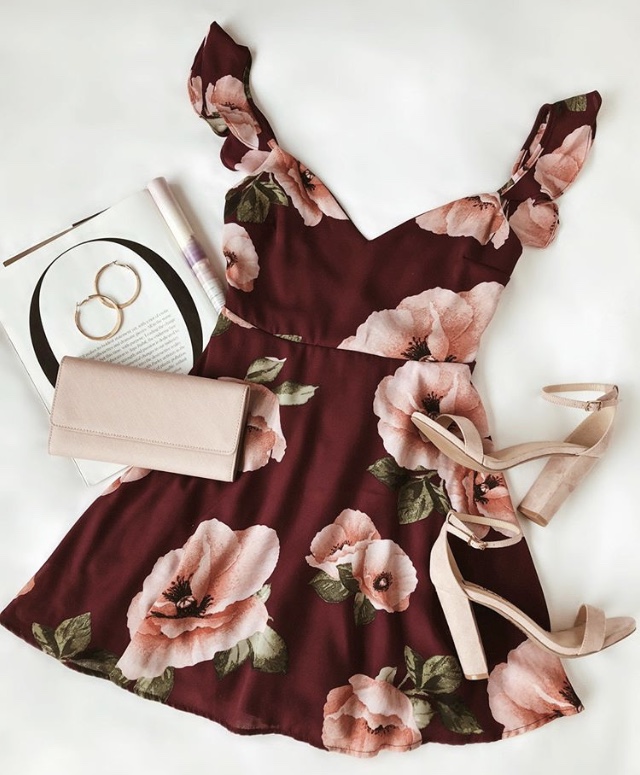 The “Floral of the above” purple floral print backless skater dress from Lulu’s.