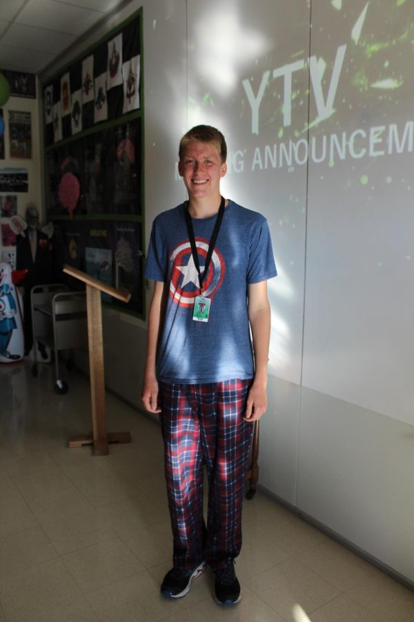 Senior drum major Ryan Rask sports his pajamas during second period for homecoming week. Photo by Gracie Weinstein 