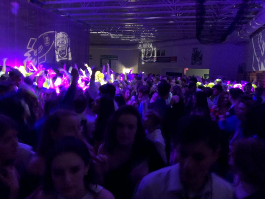 The room is packed, with hundreds of students on the dance floor