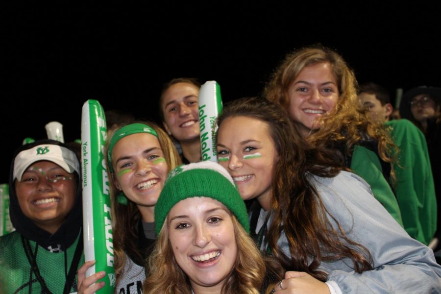 Seniors (from left to right) Izzy Smith, Noelle Pedote, Coco Conrardy, Christina Revello, Audrie Carani, and Ellie Davis show their school spirit at Yorks homecoming football game last friday. 