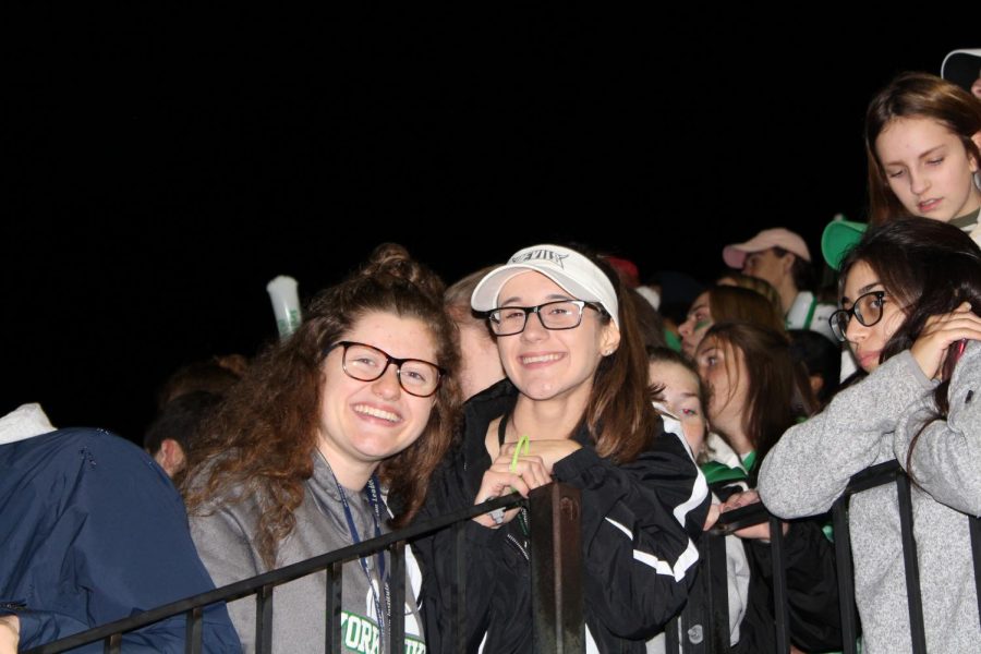 Seniors Kate Caforio and Sophia Trajcevski have big smiles for the homecoming game and the dance to come.