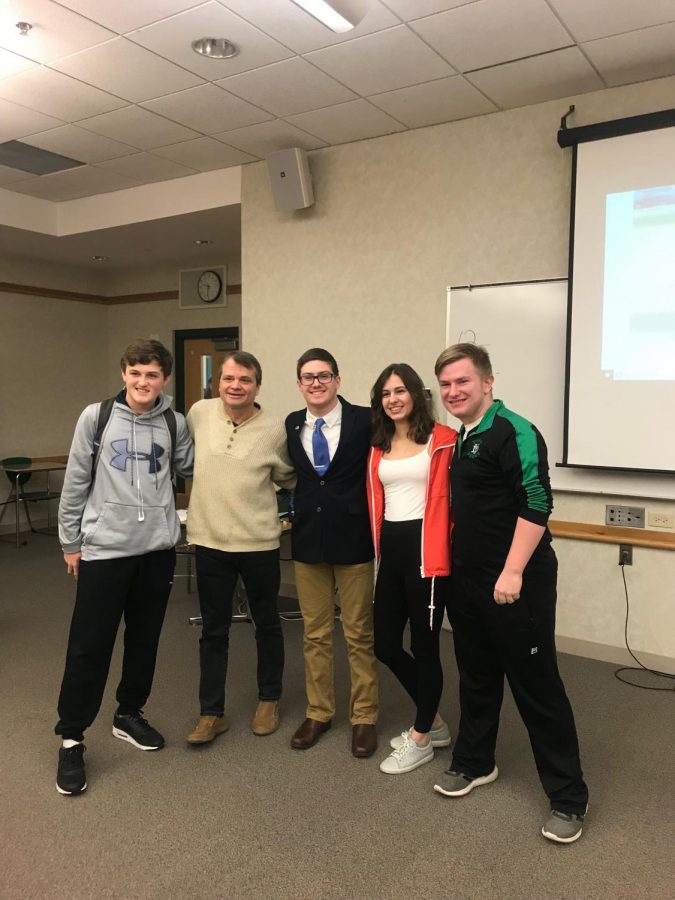 Congressman Quigley (second to the right) stands with juniors (left to right) Ryan Lynch, Ethan Thomas, Maya Wdlo, and Ronan Doyle.