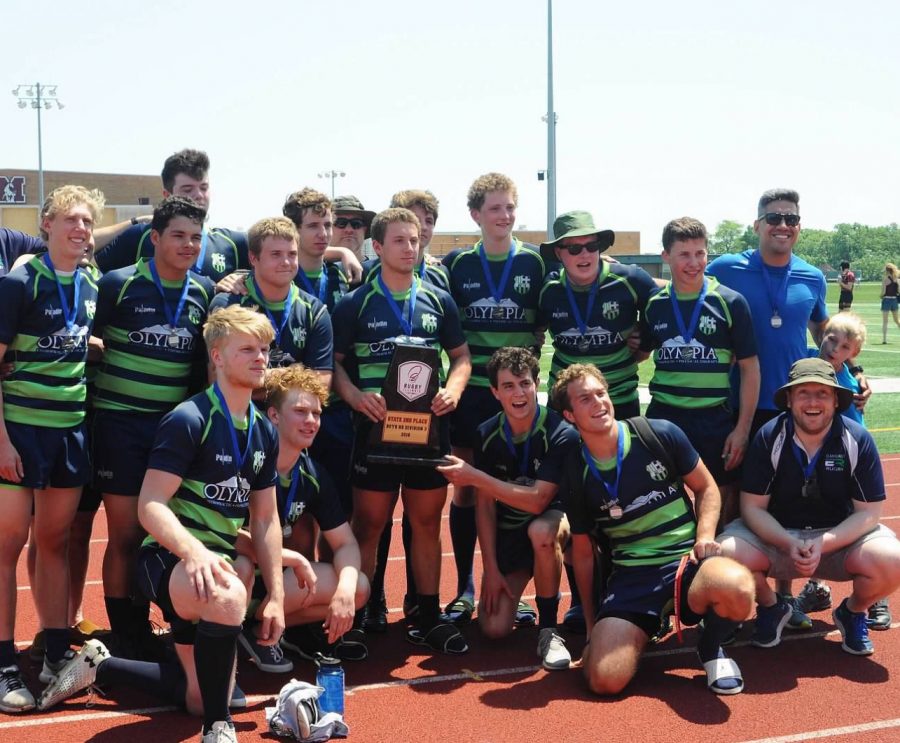 The team poses for a final photo for their 2018 season after their victory in the  Rugby Illinois Championship. 