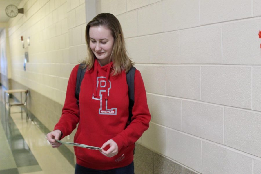 Kamila Szylkiewicz debates if she should risk being late to her class to use the restroom or use a hallway pass during class.
