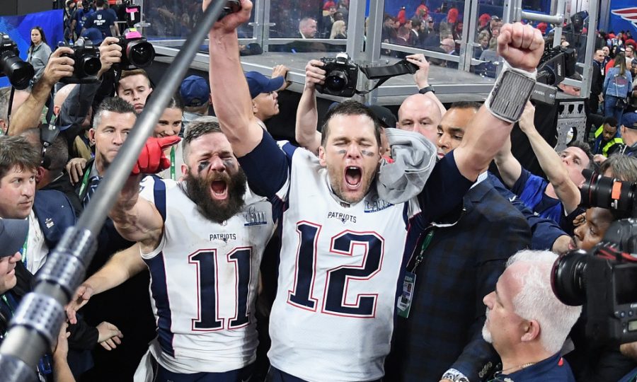 Julian Edelman (left), and Tom Brady (right), celebrate after winning Super Bowl 53. Edelman, who took home MVP honors, now has three titles with Brady. 