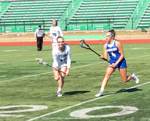 Freshman Ellie Duhig competing in a home game against Kentucky Country Day.