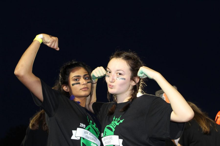 Seniors (from left) Nida Ahmed and Erin Quaid show their toughness on the sidelines. 