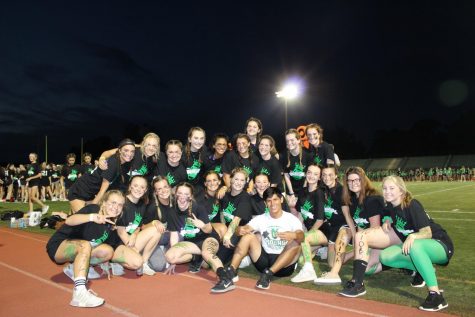 Quarter two seniors pose for a picture at the annual powder puff game. 