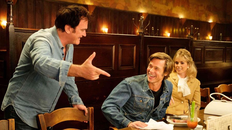 Quentin Tarantino directs Brad Pitt, in a scene in Once Upon a Time in Hollywood. 