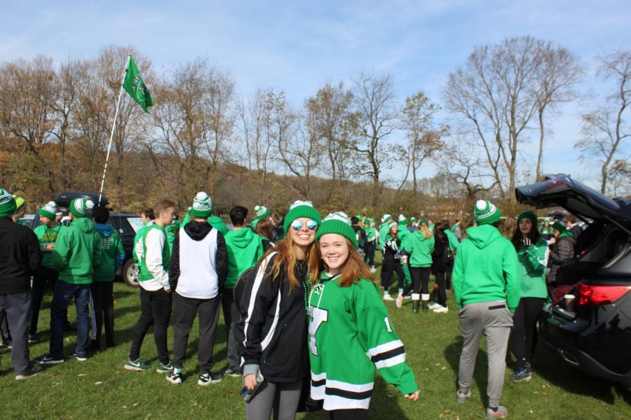 Seniors Haley Blattner and Elly Fitzgerald get together at the student tailgate.  November 9, 2019.