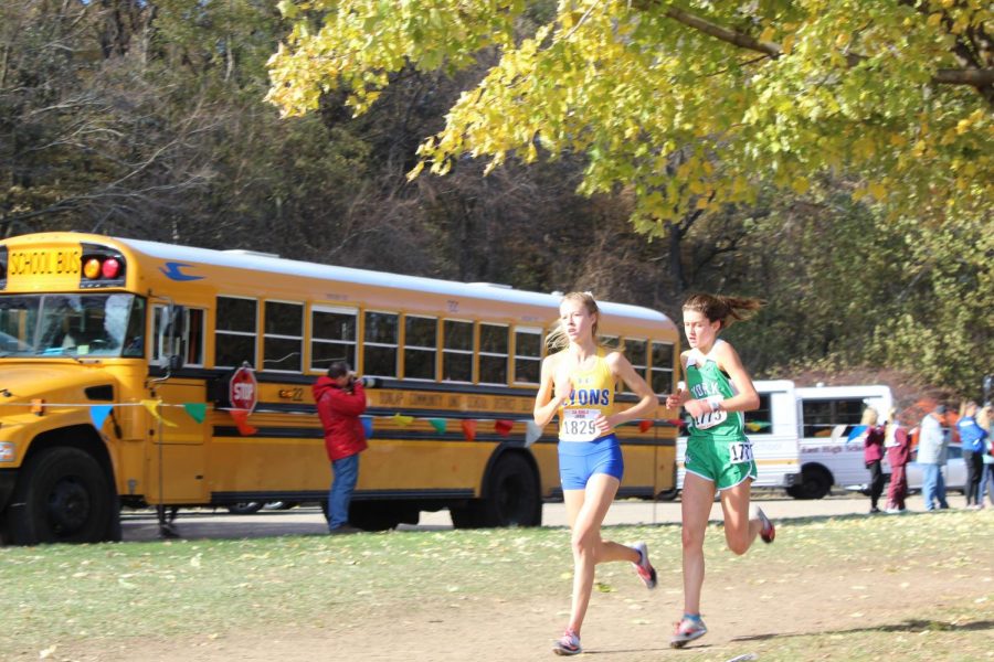 Freshman Brooke Berger sprints past a competitor from Lyons Township.