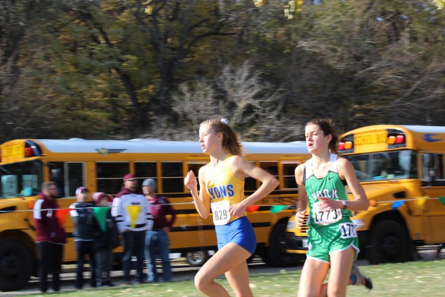 Freshman Brooke Berger sprints past a competitor from Lyons Township.
