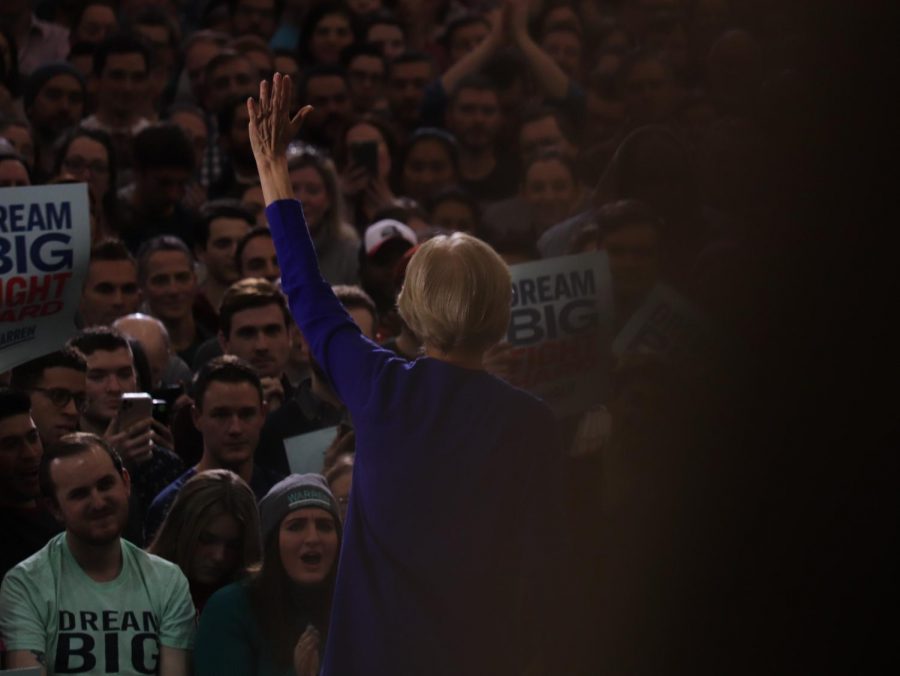 Sen. Elizabeth Warren speaks passionately as her supporters listen on.