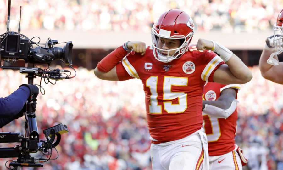 Kansas City Chiefs quarterback Patrick Mahomes reacts after scoring a touchdown during an NFL, AFC Championship football game.