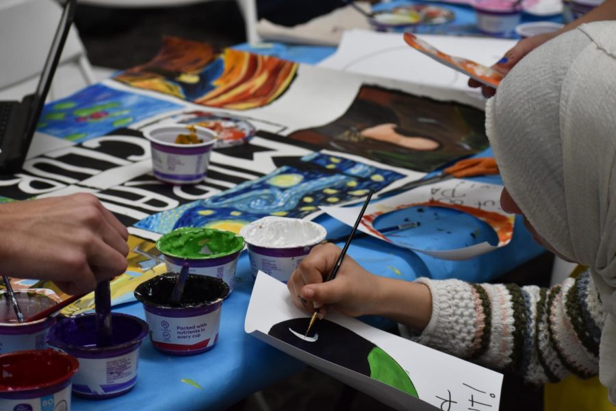 York students had the opportunity to paint pictures that will be included in mural clubs latest mural, during the art fair on Friday. 
