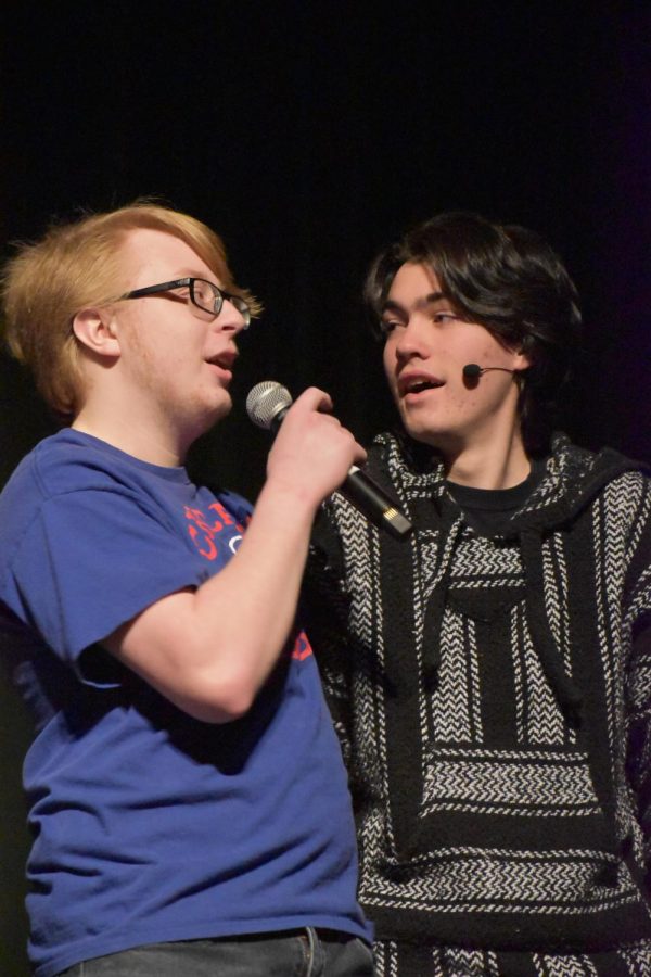 Senior William Baumgartners alias Willy B of Wisdom gives MC Charlie Kungl advice on how to overcome stage fright. 