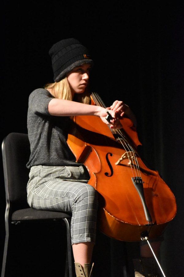 Junior Zoe Daniel performs a cello duet of Thunderstruck by AC/DC. It (the song) holds a really special place in our hearts because we played it in our 8th grade orchestra concert, Daniel said. Weve both improved so much so its really cool to come back to it and preform it for our peers.