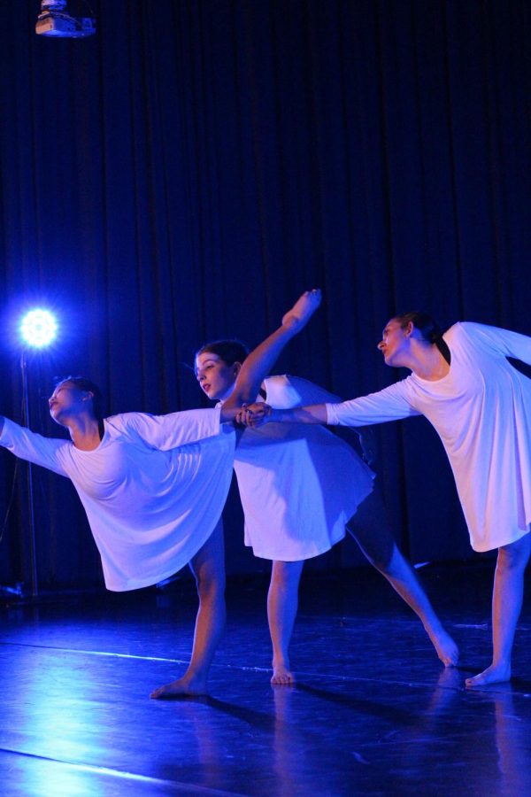Seniors May Clancy, Emma Garvey and graduate Hannah Maloy perform in graduateArianna Capotes What About Angels?in the March 2020 York Dance Company concert.