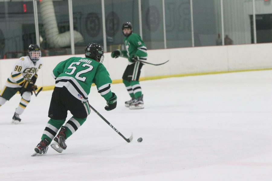 Sophomore Mike Iorii dashes the puck into the offensive zone.