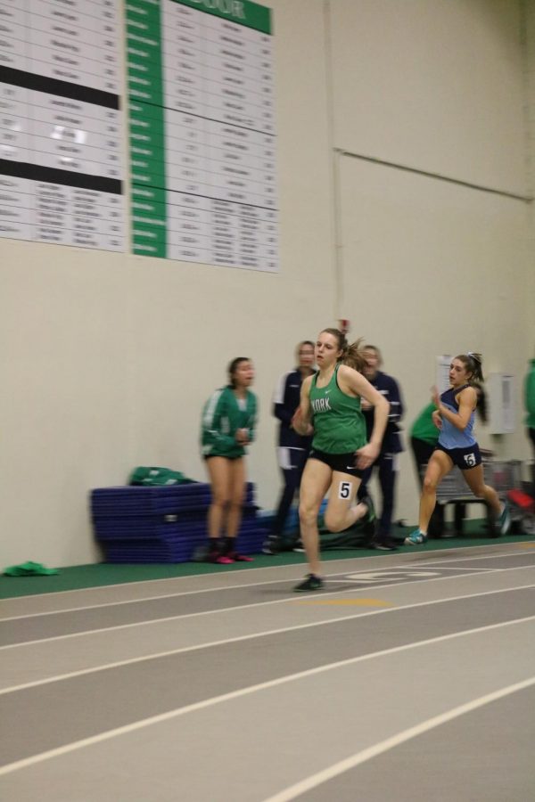 Junior Simone Bednarik sprints the varsity  300m dash in a speedy time of 44:52, a personal record, at the York Invite #3.