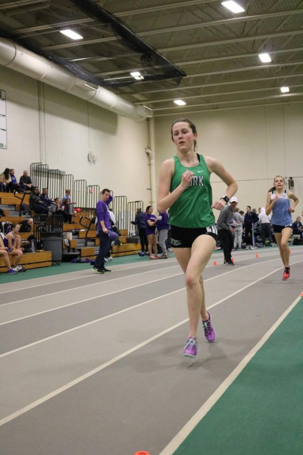 Sophomore Shannon Farrow races the 3200m run at the York Invite #3. Farrow raced a personal record of 12:48.71.
