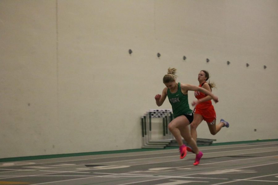 Freshman Kalina Ceglinski wins her heat of the frosh/soph 55m dash with a personal record time of 8.02 placing fourth overall.