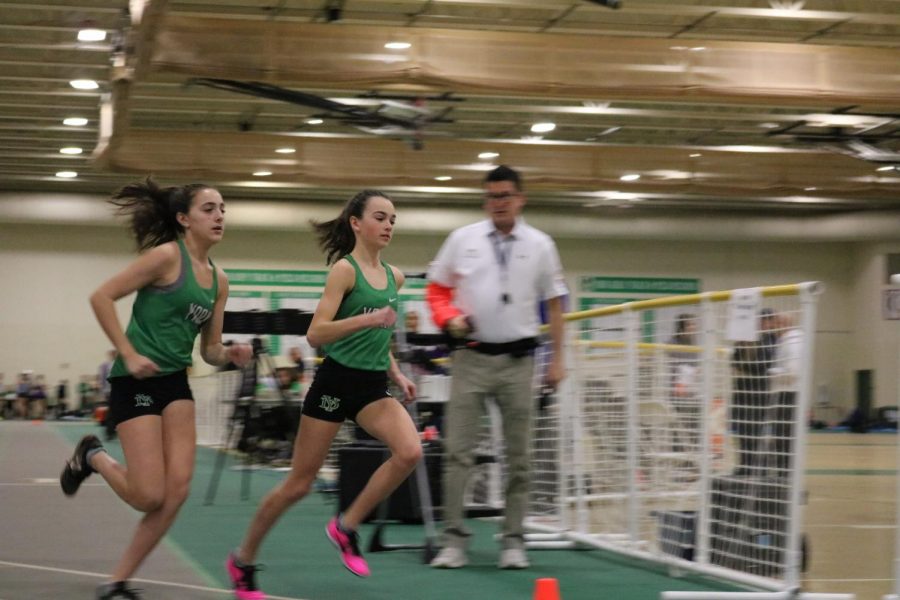 Sophomore Allison Fitzgibbons and freshman Bria Bennis compete with eachother in the 1600m race at the York Invite #3. 