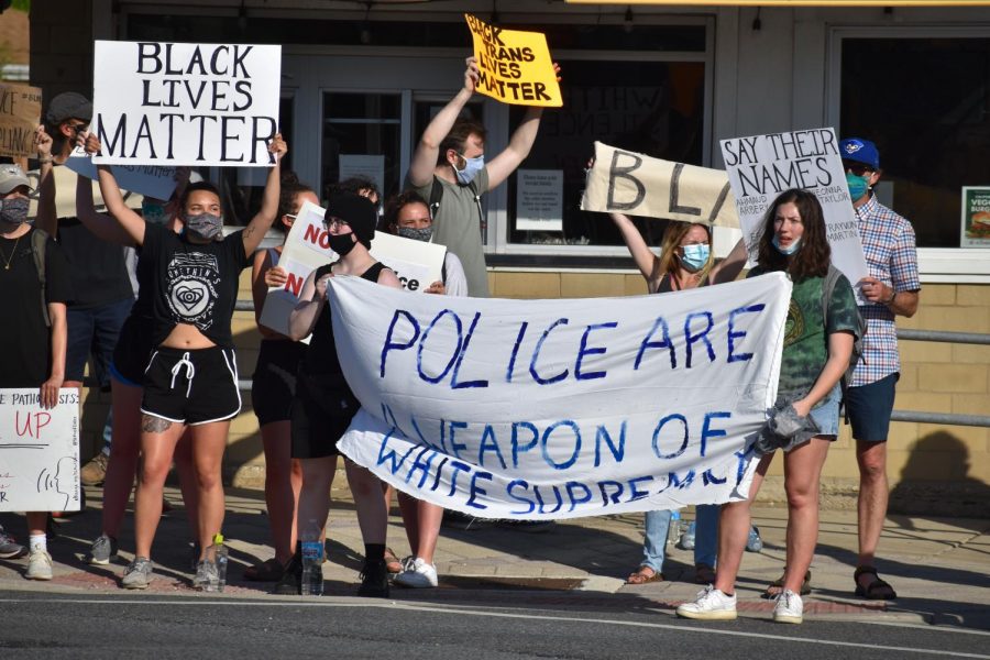 In the 90 degree heat, peaceful protestors in Elmhurst hold up signs and chant “Black Lives Matter”. Other chants included the names of the recent victims of police brutality, “no justice, no peace, no racist police” and “this is a peaceful protest, this is not a riot”. 