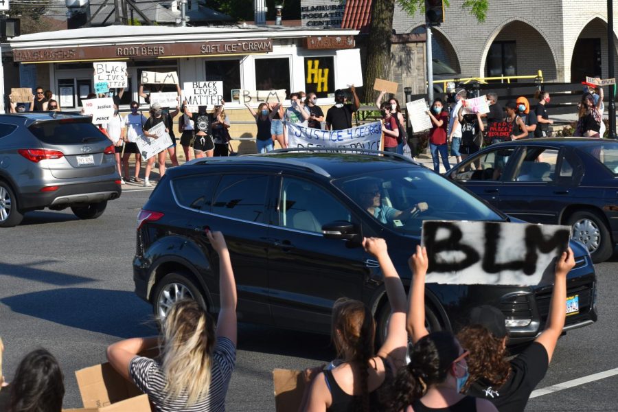  The Tuesday protest united members of the Elmhurst community and remained peaceful as protestors and passing vehicles showed their solidarity for the black lives matter movement. 
